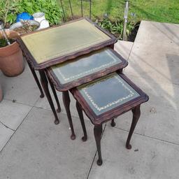 vintage 1980s beautiful mahogany nesting tables set of 3. Green leather tops large has glass missing costs pennies to replace.  dimensions large h 53cm w 55cm d42 cm. medium h50cm w 43 cm d 37cm. small h 48 cm w 33 cm d 28 cm. beautiful carved wood with queen Anne  legs. selling on the Internet for between £600-£300 in same condition open to sensible offers helping my dad out