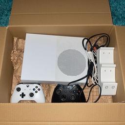 Xbox one S white digital edition. Comes with power lead, HDMI, venom charging dock, white controller & spare black controller.