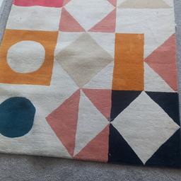 multicoloured wool rug.