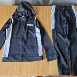 Here for sale is a great condition black Nike tracksuit in their size M which works to aged 10-12 years on their size chart.

Collection only Norton Canes