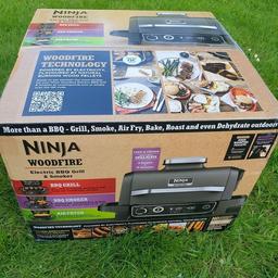 Totally brand new & still sealed.

Ninja Woodfire Electric BBQ Grill Smoker Outdoor Barbecue Grill & Air Fryer Roast Dehydrate

DISCOVER A NEW WAY TO COOK OUTDOORS: All-in-one electric BBQ grill, smoker and air fryer with authentic smoky flavours.
7 OUTDOOR COOKING FUNCTIONS: Grill, Smoke, Air Fry, Roast, Bake, Reheat, Dehydrate. Fits 8 burgers, 16 sausages or 2 racks of ribs.
WOODFIRE TECHNOLOGY: Integrated smoker box burns 100% real wood pellets for natural woodfire flavours. 2 ways to smoke, low & slow smoking for tender results or quickly add smoky flavours to any food.

INCLUDES: Ninja Woodfire Outdoor Grill (UK Plug) Pellet Starter Pack (All-Purpose & Robust Blend), Pellet Scoop, Crisper Basket, Recipe Guide. Colour: Grey/Black
DIMENSIONS: H34cm x W46cm x D46cm. 

RRP £399.99

Collect Bedford or Milton Keynes.

MA2UIA