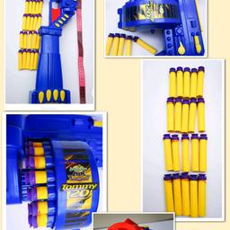 Tommy Gun 20 Air Blaster Motorist Blue Buzz Bees Toys with sound & 20 Suction Darts
On off to make sound to open fire
Acceleration Rapid Fire!
Fires approx up to 20M Adjustable shoulder rest Approx Length fully extended 63cm Approx Width 25cm 
What's included
1 Original BuzzBeesToys Air Blaster Tommy Gun Blue Sound & Automatic Fire
20 Original Firing Suction Darts yellow purple
NO Original Box
No Instructions But real easy to use
Batteries required 3xAA Not included
Pre-owned Great condition