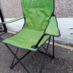 Compact Folding camping chair on a black metal framework with a green cloth cushion 
Nice compact and lightweight design 

In overall good clean and fully usable condition 

NO DAMAGE OR ISSUES 

Postcode for collection is bd2 4bs  - Just off Queens Road Bradford 2 area

Delivery requests will incur a extra charge of minimum £10 plus