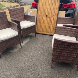 Garden table and 4 Rattan chairs , all in good condition, 4 cushions included but need recovering