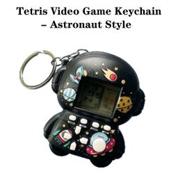 Brand new and comes with boxes. Keychain Astronaut Shaped Tetris Portable Game.
