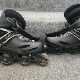 inline Skates 
adjustable size 3-6

black and the Skates come with a carry bag 

pick up only