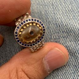 Hallmarked 925 silver ring vert thick and solid with genuine natural sulaymani precious stone in shop of a eye 👁️. Surrounded with bleu topaz. Pls look at the pictures attached for more details can accept PayPal,collection , bank transfer or delivery of code by . Shpocks wallet too