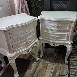 a lovely French style white solid wooden bedside drawers .h 68 cm width 50 vm depth 30cm