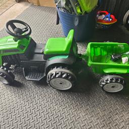Kids ride on tractor with trailer and charger, fully working, battery holds full charge, minimal signs of wear and tear.