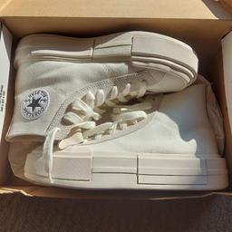 converse platform chuck taylor all star cruise high tops. cream off white colour. size 7. in original box. tags were removed but never worn. daughter desperately wanted them and then decided she didn't like them!