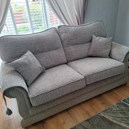 3 seater sofa with cushions,and one chair,sofa size approx 2meters, chair is approx 1meter,it is not discoloured just the picture .