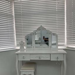 White dressing table, has a few visible marks on there . Width 42” roughly and height around 30”