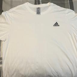 White Adidas T. Size L. Great condition