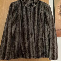 Grey/Black faux fur jacket
zip fastening & side pockets 
only worn once or twice
In excellent condition 

FROM SMOKE & PET FREE HOME 
LISTED ELSEWHERE 
COLLECTION B31 OR B32 OR B14