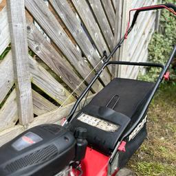 Petrol lawn mower with basket runs well had it’s cleaned down carb cleaned fresh fuel in ready to use