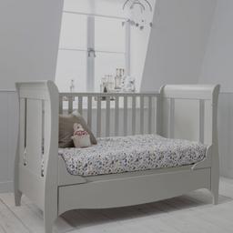 Lovely light gray babies cot bed, in excellent condition.
The base can be set to different heights to make it easier to reach your baby and one the child is older it can be converted into a bed by either simply removing one side or you can remove both sides and lower the ends to make a 'proper' bed.
It comes with nice clean mattress 70 x 140cm with removeable/washable cover. 
Complete with all fixings and the frame is in excellent condition with no marks or scratches. Has now been dismantled for transport

