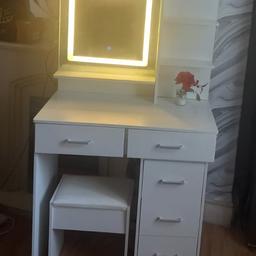 brand new dressing table with
different shades of lights shown in picture
and comes with stool brand new
and allready built