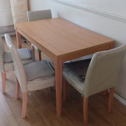 Wooden table in good condition 
Chairs are heavily worn

Collection only