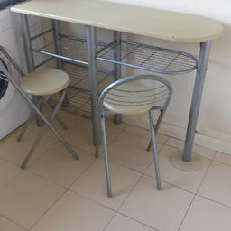 Two foldable chairs with breakfast table.

Collection only
