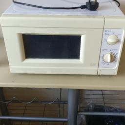 Small microwave

In working condition