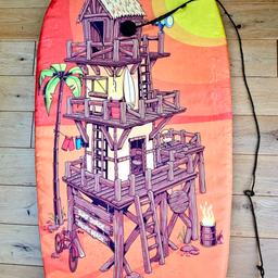 Surf Foam Bodyboard Orange Black with printed wooden shack picture 
width 46cm
length 82cm 
with ankle strap with velcro 
Perfect for any age trying Body surfing 
Light weight
Pre-owned previously used item still good condition 

Cash on Collection Cannock Area