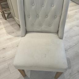 Buttoned dining chair, I used as office chair. With wooden legs, chair needs a clean or upholstery price reflects this. W: 50cm H: 85cm