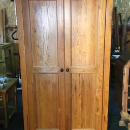 Solid oak double wardrobe. Really heavy piece of quality furniture. It has a full length hanging rail inside. Odd little mark here and there from being moved over the years. Measuring 112cm wide x 58cm deep x 193cm tall. Viewing/collection is Leeds LS24 & delivery is available if required - £125