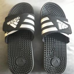 Selling a pair of Adidas Sliders  Size 6,Good Condition from smoke and pet free home, NO OFFERS PLEASE NO HOLDING, THANKS.