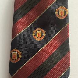 A Man Utd tie from the 1990's.
Official club merchandise.
It features the old version of the Football Club crest that was introduced in 1993.
In excellent condition.
£24.95 ono.