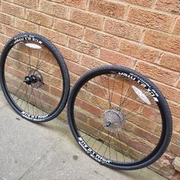 28"700c Hybrid Road wheels with near new tyres 
These wheels have been used once 
They have a 10 speed shimano rear setup for road use.
Both come with discs front & rear tyres tubes ect ready to use.
Schwalbe Sammy slick tyres front and rear
Can deliver for fuel