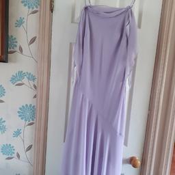 Lilac thin strapped midi length dress.
Floaty material
worn couple of times
In good worn condition 
GROM SMOKE & PET FREE HOME 
LISTED ELSEWHERE 
COLLECTION B31 OR B32 OR B14
