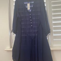 BNWT bought from Evans last year. 
Navy blue shirt dress. Has thin half belt can be tied at front or back. 
Size 22/24. 

See other ads for BNWT dresses from Evans