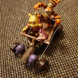 I'm selling winnie the pooh and friends go-cart ornaments in really good condition 9.5inch across 6.5inch high approximately.