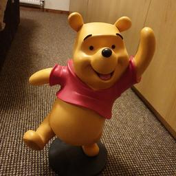 I'm selling a large winnie the pooh ornament, he is in good condition, he's 16inch high and 9.5inch across approximately