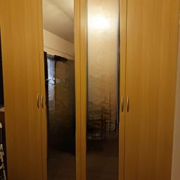all in one, 4 door mirrored wardrobe, immaculate condition, excellent condition and sturdy made, height 7ft, lenght 69.5 inch, depth 2ft.
