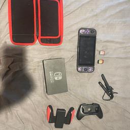 Nintendo switch bundle includes; oled 32 gb nintendo swtich, extra 128 gb storage, custom controllers, 2 controller holders, 2 bumper addons, case, tv broadcasting holder, super physical mario bros game, physical mario kart game, few pokemon and mario games bought digitally. Can negotiate on price