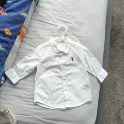 Beautiful white shirt from Next. My son only wore this once for 2 hours. Size 3-6 months. Will look lovely on your handsome baby