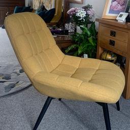Mustard colour material relaxing chair from dunelm