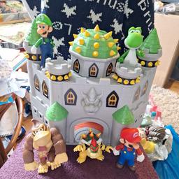 Nintendo orignal Castle, this item is used , working sounds..but losing sticker from back of a tower.
Figures are not orignal too large for  inside of caslte but a brilliant price for all no offers.
15.00 Great play value..