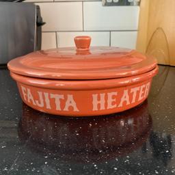 Terracotta serving dish to keep you wraps warm. Microwave and oven safe