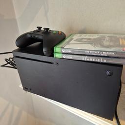 like new Xbox series x hardly ever used comes with 2 games and controller