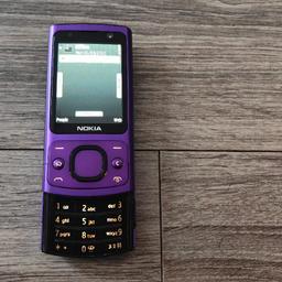 Nokia 6700 Slide Mobile Phone Purple (Vodafone), In good working condition, Charging port cover missing. Handset only.