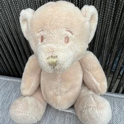 Cute lightweight little teddy bear by Baylis &Harding.has stitched face and joint floppy arms and legs.traditional teddy bear beige colour.Height 17cm in very good clean condition has not been played with just stored away needs a new home