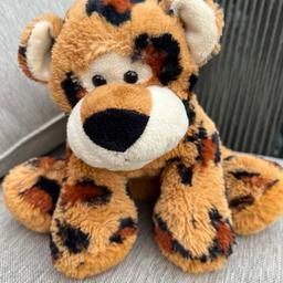 Amazingly super soft and snuggly you won’t want to put it down so soft.tiger orange/brown colours.bottom part of you has beans in.height 30cm.made by Smiths toy shop.in very good condition.has not been played with.needs a new home