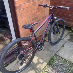 Girls mountain bike
Age 10 upwards
Used but Very good condition in good working order
Shimano gears 
Disc breaks
Front suspension 
Quick release wheels
Adjustable seat and handle bars