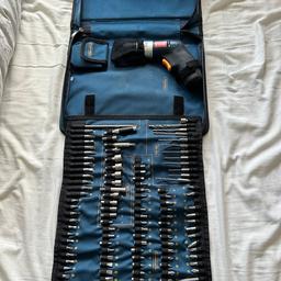 Ryobi 4.8 volt drill and bit set. 

There are 3 or 4 drill bits missing which are flat-head bits but the majority bits are there.