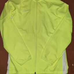 brand new lightweight nike dri fit jacket size uk small unused bright colour for running and other sports activities. check out my other items for sale too thanks