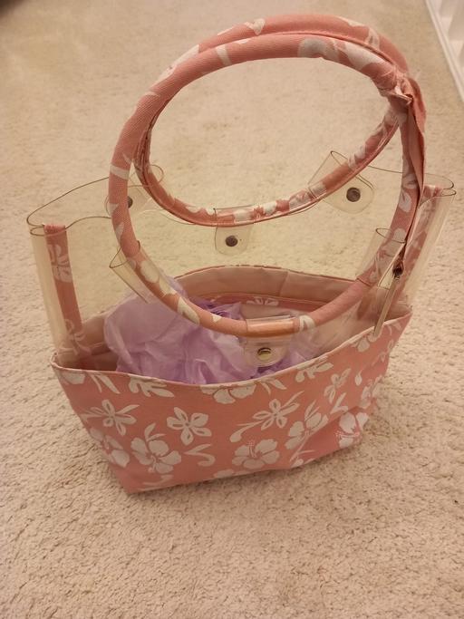 Buy & Sell Surrey Guildford - Photos for Pink and white floral patterned small bag