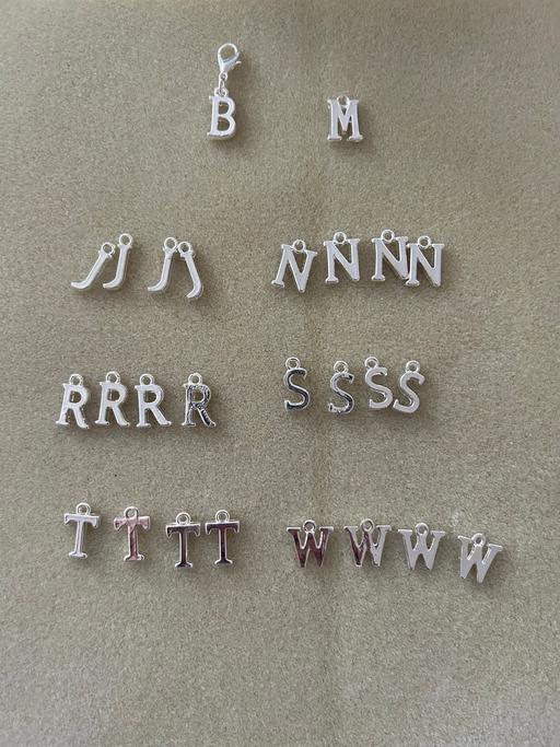 further learning Hertfordshire Dacorum - Photos for Mixed lot of silver plated letter charms