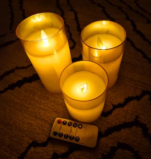 Buy & Sell Surrey Guildford - Photos for Battery Operated Flickering Coppe Candles Set